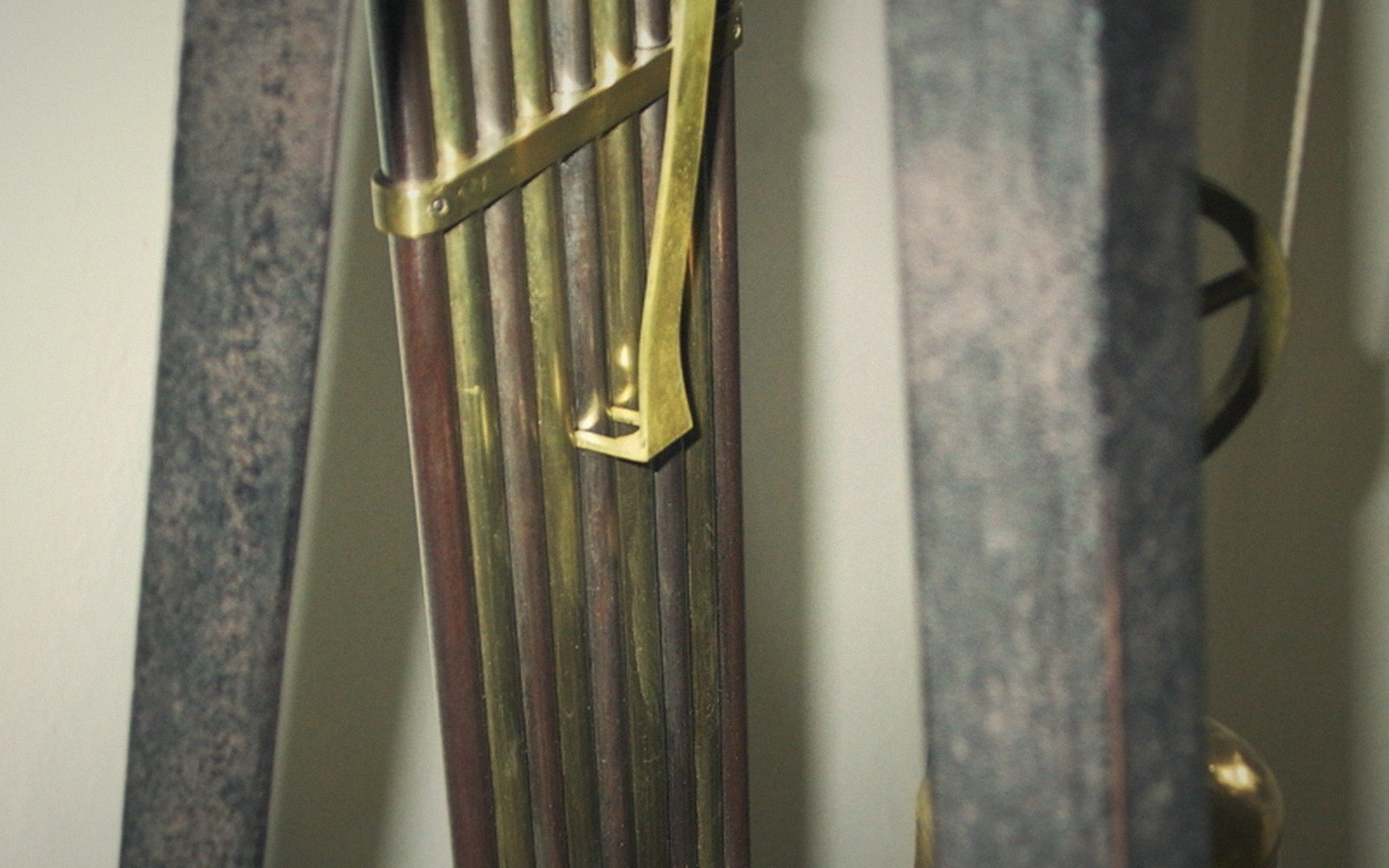 A gridiron pendulum of parallel brass and steel rods